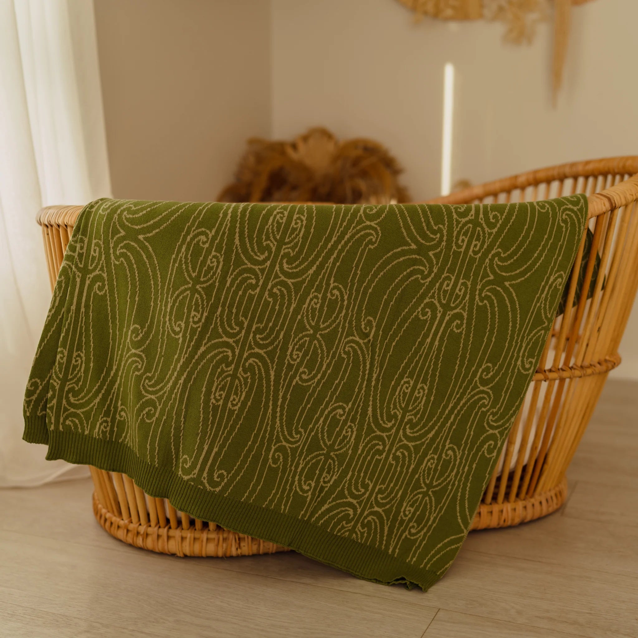 Manaaki - Ngahere Pepi Knitted Blanket